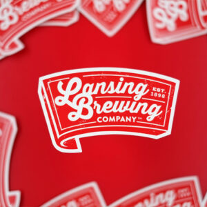 Stack of fast and affordable custom stickers printed for Lansing Brewing Company