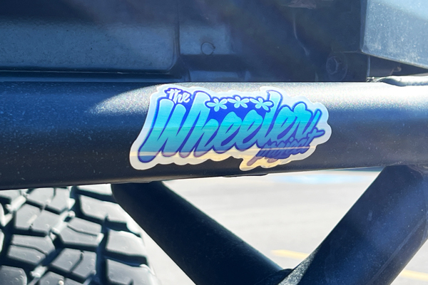 brushed aluminum stickers applied to to rear bumper of truck