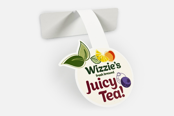 Custom shelf wobbler hanging from retail shelf for Wizzie's Juicy Tea