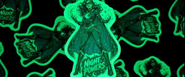 Custom glow in the dark logo sticker glowing green in the dark
